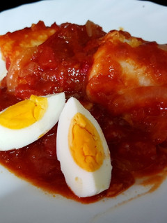 Una foto de Bacalao con tomate