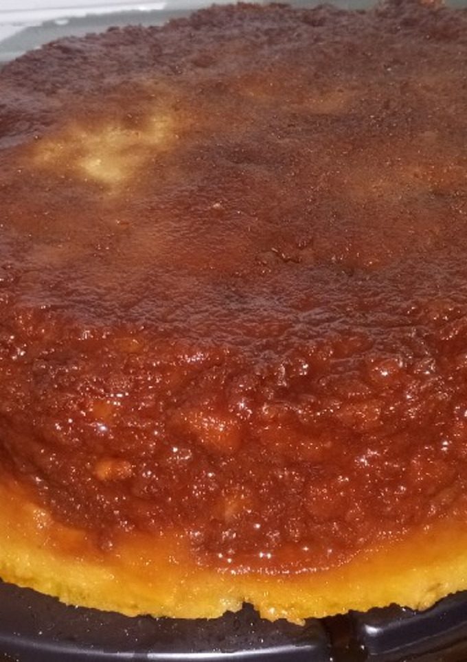 Una foto de Budín de pan súper alto y dulce