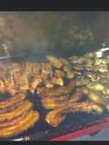 Grilled Pork Belly and Marinated Ribs with Potatoes, Zucchini, and Onions