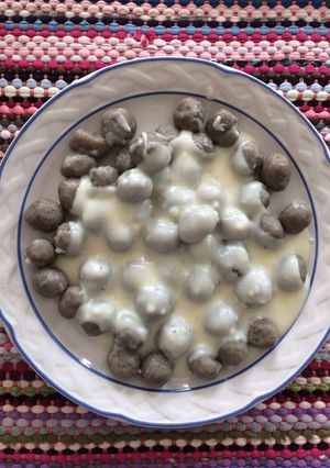 Una foto de Ñoquis de batata con salsa blanca