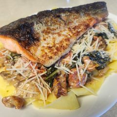 A picture of Brad's seared sockeye salmon with pappardelle pasta and a Tuscan inspired sauce.