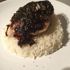 A picture of Chicken with Blueberry Sauce and Rice.