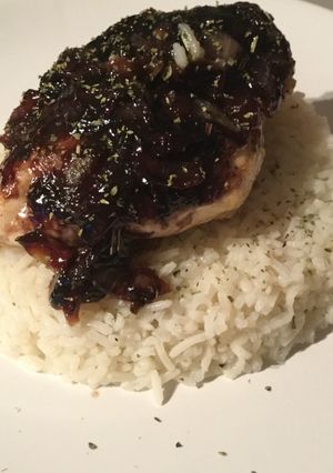 A picture of Chicken with Blueberry Sauce and Rice.