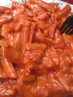 A picture of Red sauce pasta.