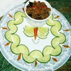 A picture of Haidrabadi tridishnal gosht ka achar.