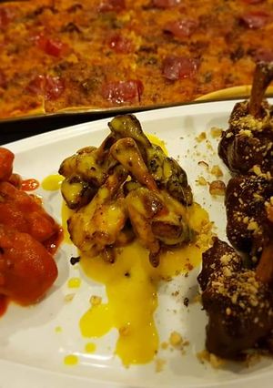 Una foto de Alitas en salsa picante