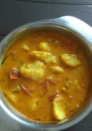A picture of Potato sabji in buttermilk curry.