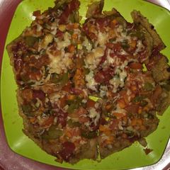Maize flour pizza with chat flavour A picture of Maize flour pizza with chat flavour.