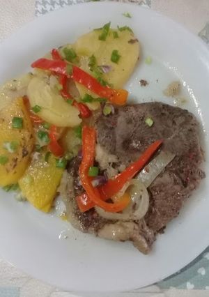Una foto de Bifes a la criolla
