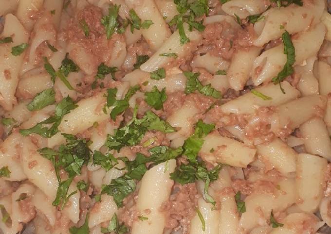 Step-by-Step Guide to Prepare Any-night-of-the-week Penne in corned beef garnished with dhania