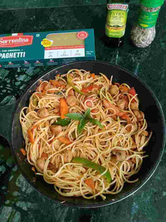A picture of Spaghetti Pasta Bolognese with Soya and Veggies.