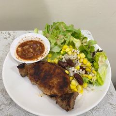 A picture of Grilled pork with Northeastern Thai spicy sauce.