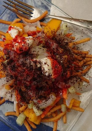 Una foto de Botana tijuanense(churros locos)