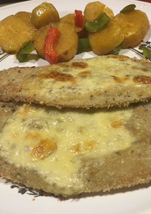 Una foto de Milanesa de berenjena con batatas