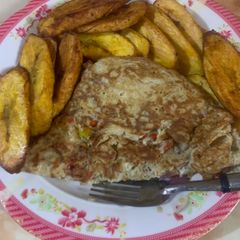 A picture of Plantain and fried eggs.
