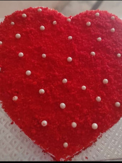 A picture of Heart shape Valentine special Red velvet cake.