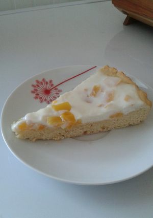 Una foto de Kuchen de duraznos