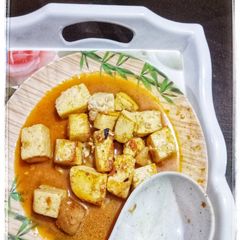 A picture of Tomato Paneer.