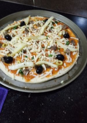 صورة لوصفة بيتزا المحلات