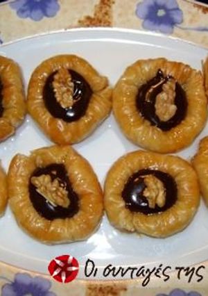 A picture of Chocolate nests with syrup.