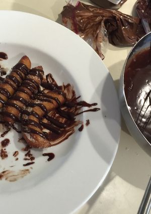 A picture of Churros with Dulce de Leche and Chocolate.