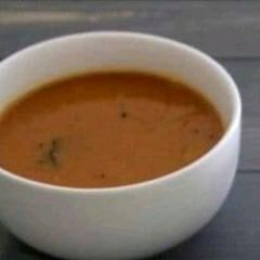 A picture of Sambhar and Peanut chutney.