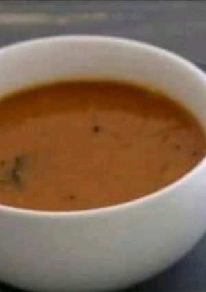 A picture of Sambhar and Peanut chutney.