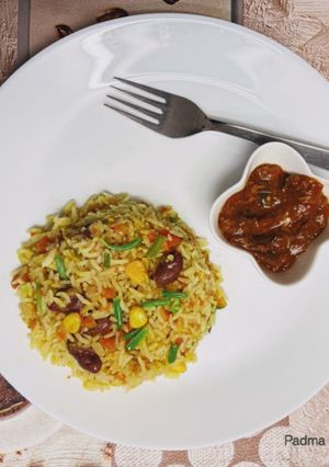 A picture of Mexican Rice with Leftover Rice.