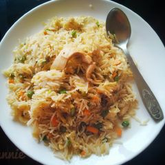 A picture of Chicken fried rice.