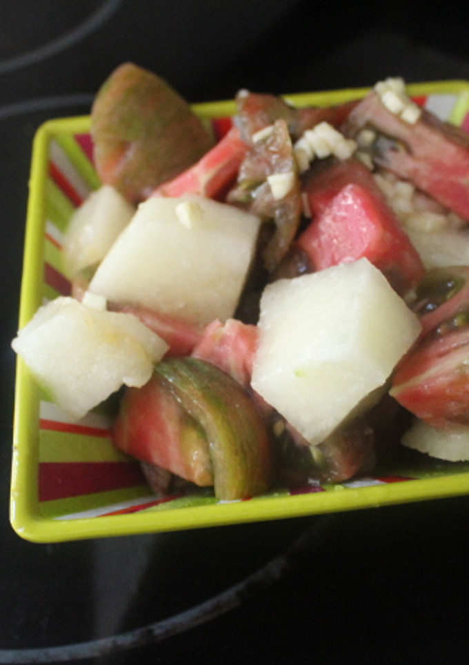 Una foto de Ensalada de tomate y melón