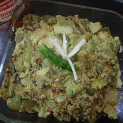 A picture of Ridge gourd with poppy seeds paste (jhingey aloo posto).