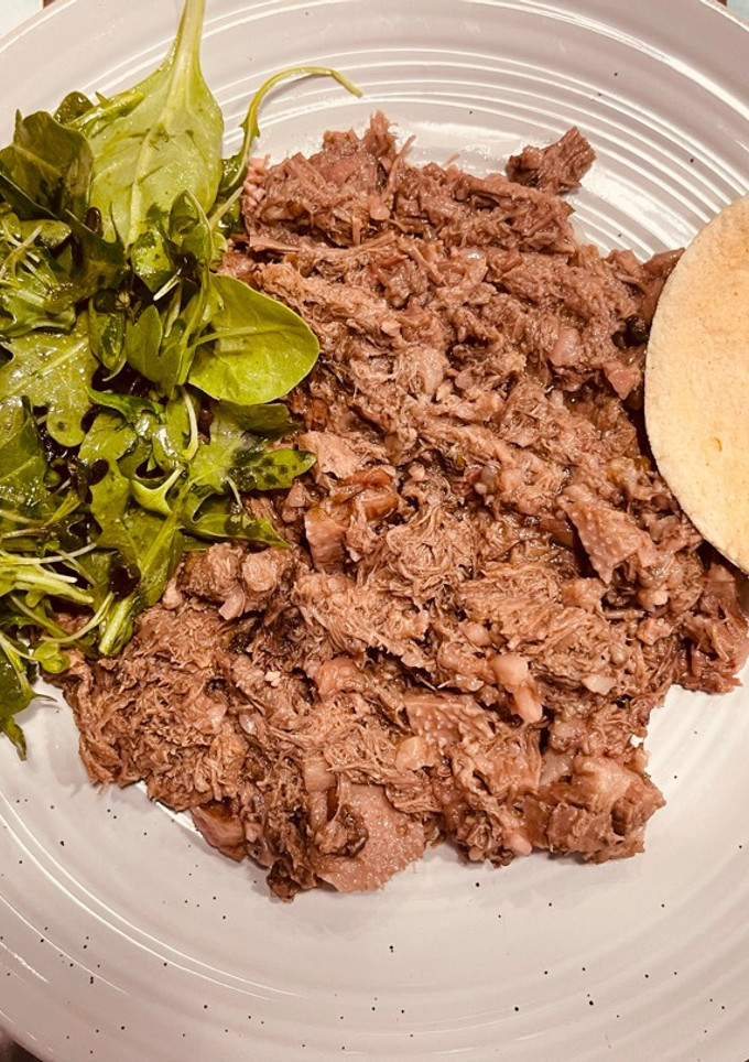 Una foto de Barbacoa de Lengua