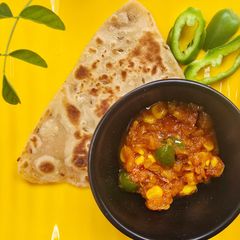 A picture of Corn 🌽 capsicum 🫑 vegetable.