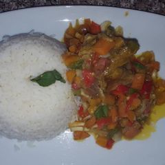 A picture of Rice with veggie sauce.
