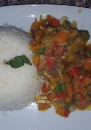 A picture of Rice with veggie sauce.