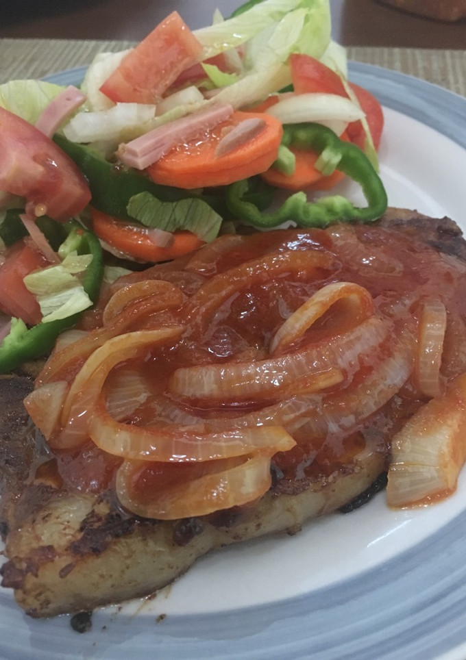 Una foto de Chuleta encebollada