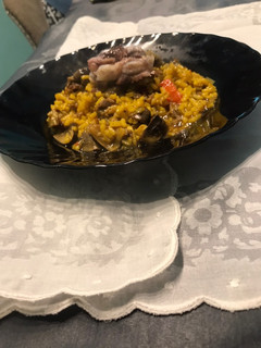 Una foto de Arroz con costilla y setas