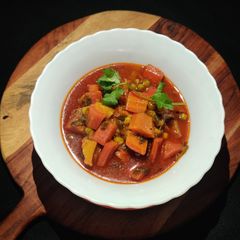 A picture of Gajar matar aloo curry.