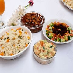 Fried veg white rice with shredded chicken soup A picture of Fried veg white rice with shredded chicken soup.