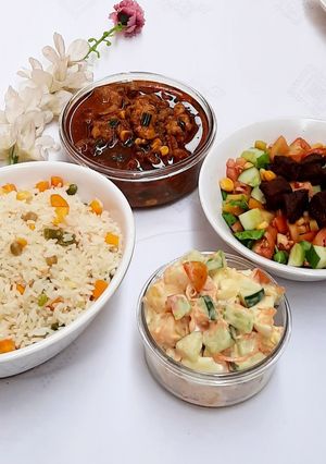 A picture of Fried veg white rice with shredded chicken soup.