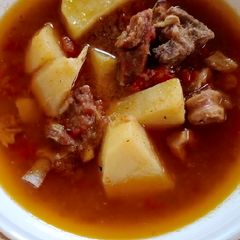 A picture of Aloo gosht.