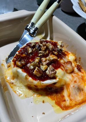 Una foto de Camembert al horno