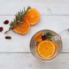 A picture of Satsuma, rosemary and cranberry pick me up 🍊 🌿.