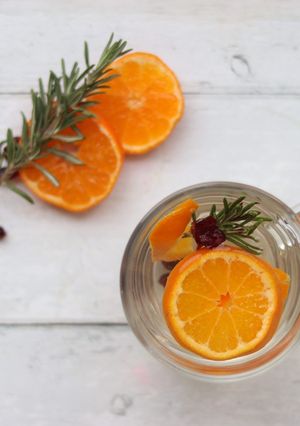 A picture of Satsuma, rosemary and cranberry pick me up 🍊 🌿.