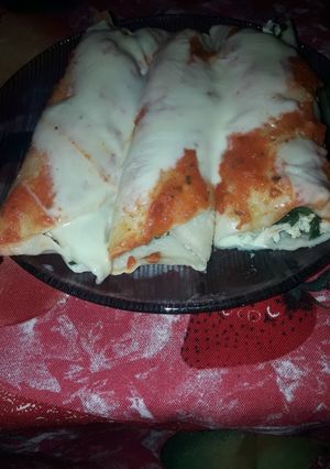 Una foto de Canelones espinaca y pollo