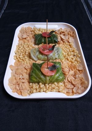 A picture of Potato Soyabean Stuffed Cabbage Parcel.