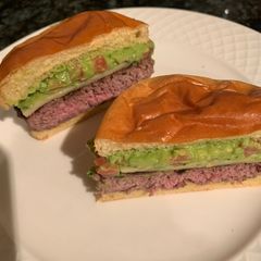A picture of Guacamole cheeseburger 🍔.