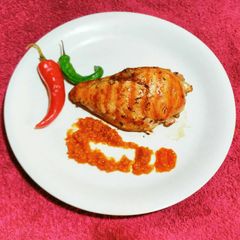 A picture of Grilled Chicken with Herb Sauce.