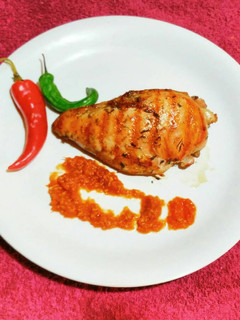 A picture of Grilled Chicken with Herb Sauce.