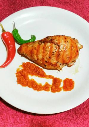 A picture of Grilled Chicken with Herb Sauce.